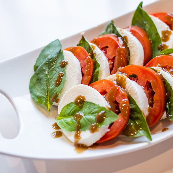 Caprese salad featuring Grande fresh mozzarella cheese