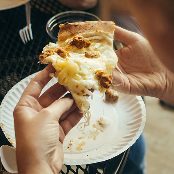 Pizza slice featuring Grande fresh mozzarella cheese