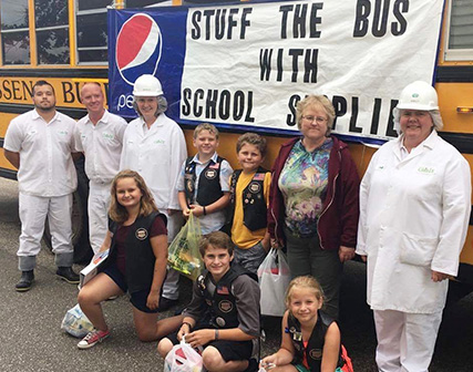 Grande Cheese Stuff the Bus community involvement event